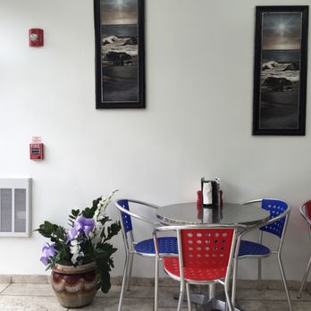 Talia's Grille - Red and blue seats, small area, fresh flowers - Mediterranean Near Me - Philadelphia, Pennsylvania Talia's Grille - Red and blue seats, small area, fresh flowers - Mediterranean Near Me - Philadelphia, Pennsylvania