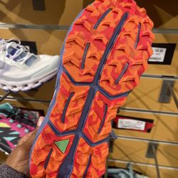 REI - Trail shoe with soles made to mimicking cougar paws?? (Sales pitch sounded exaggerated but it does look like a good grip)