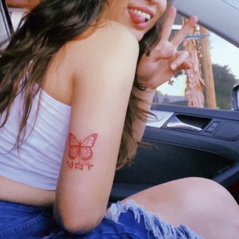 Playink Tattoo Studio - loving the tattoo and its perfect placement! *photo with a filter, but this was only moments after and I still have the protective wrap on* - Tattoo Near Me - Placentia, California