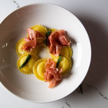 Cotto Belltown - a plate of ravioli with prosciutto - Italian Near Me - Seattle, Washington