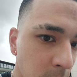 Tabu's of Reno Barber Lounge - Low-bald fade and 90's hip-hop eyebrow cuts!