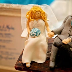 Sweets By Design - Customized bride and groom cake topper, complete with their black Labrador at their side.