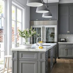 Artistic Kitchens & More - Grey is the new white! #lovethekitchen Shaker Style Cabinets that are refaced with a beautiful island and modern lighting.