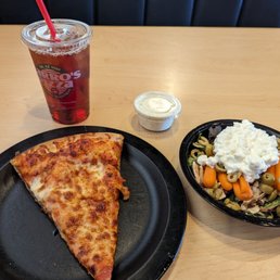 a slice of pizza and salad a slice of pizza and salad