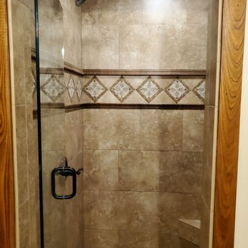 Our Place Hotel - Sit down shower with water pressure that will put you at ease. - Hotels Near Me - Nashville, Georgia Our Place Hotel - Sit down shower with water pressure that will put you at ease. - Hotels Near Me - Nashville, Georgia