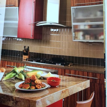 Modern Living Environments - Mix of woods,glass,countertops and cabinets give this modern kitchen some personality/Phoenix Home and Garden Magazine - Interior Design Near Me - Phoenix, Arizona