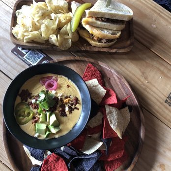 Longtab Brewing - Pork on sourdough sandwich and queso with chorizo - Brewpubs Near Me - San Antonio, Texas