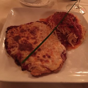 Amato - a plate of food on a table - Italian Near Me - Laval, Quebec Amato - a plate of food on a table - Italian Near Me - Laval, Quebec