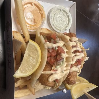 Gordon Ramsay Fish & Chip - Fishwich with extra lemon wedges, sea salt "chips" , siracha aioli and tartar on the side. - Seafood Near Me - Reno, Nevada Gordon Ramsay Fish & Chip - Fishwich with extra lemon wedges, sea salt "chips" , siracha aioli and tartar on the side. - Seafood Near Me - Reno, Nevada
