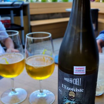 Dieu du Ciel! - a bottle of beer and two glasses of wine - Brewpubs Near Me - Saint-Jérôme, Quebec Dieu du Ciel! - a bottle of beer and two glasses of wine - Brewpubs Near Me - Saint-Jérôme, Quebec