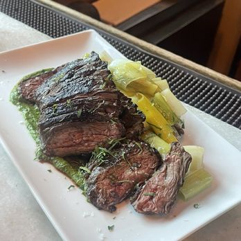 Tia Pol - Falda de Res (skirt steak with salsa verde) - Tapas Bars Near Me - New York, New York Tia Pol - Falda de Res (skirt steak with salsa verde) - Tapas Bars Near Me - New York, New York