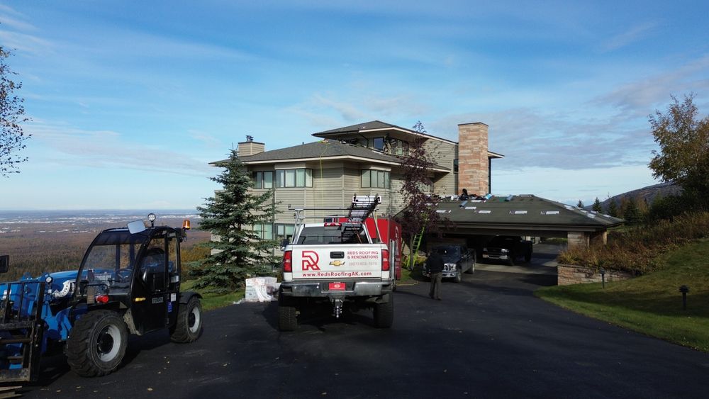 Slide of Reds Roofing & Renovations