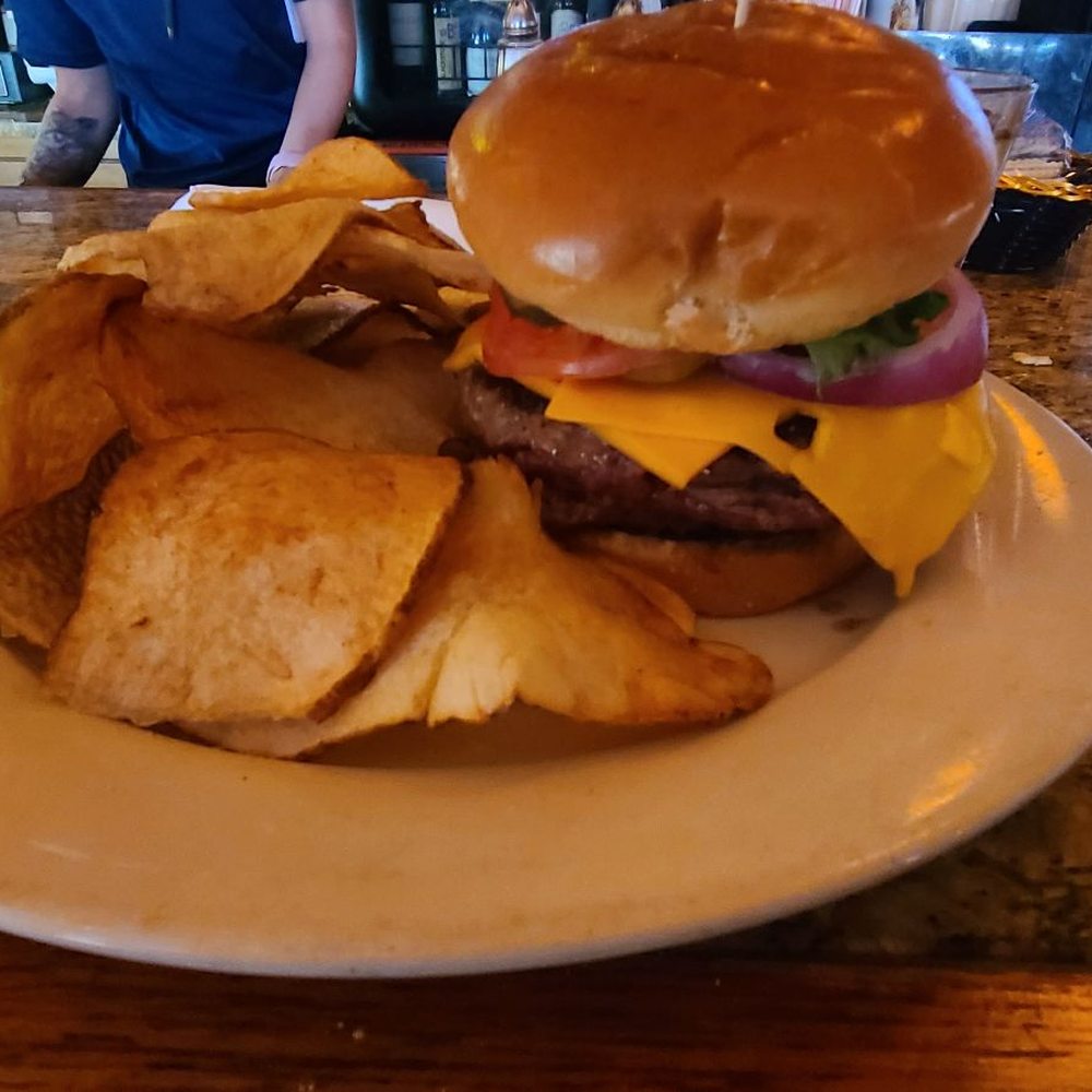 Burger with handmade chips Burger with handmade chips