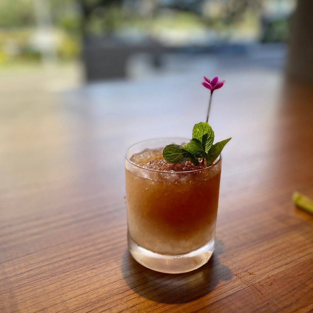 B-Side Coffee Bar - a drink with a flower in it - Coffee & Tea Near Me - Honolulu, Hawaii B-Side Coffee Bar - a drink with a flower in it - Coffee & Tea Near Me - Honolulu, Hawaii