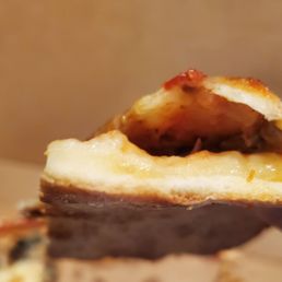 "Thin crust" was chewy and doughy. Wouldn't recommend for those who like thin and crispy pizza.