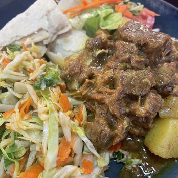 Reggae Pot - Curry goat and cabbage. - Caribbean Near Me - Centennial, Colorado