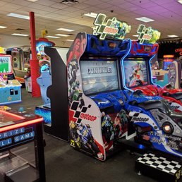 a row of arcade games a row of arcade games