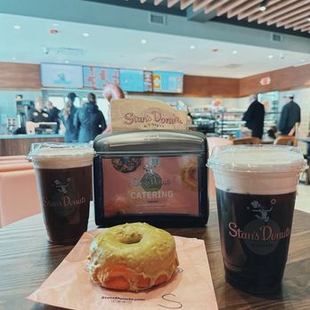 Stan's Donuts & Coffee - Pistachio donut and Cold Brew with Hazelnut Cold Foam - Donuts Near Me - Rosemont, Illinois Stan's Donuts & Coffee - Pistachio donut and Cold Brew with Hazelnut Cold Foam - Donuts Near Me - Rosemont, Illinois