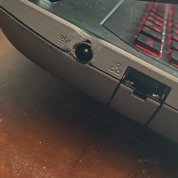 Cyberdragon Computer Repair - Laptop issue I went to Wolfie for, smoking and melted charging port