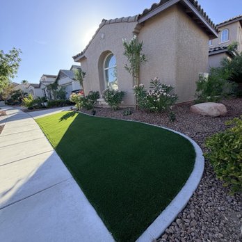 Pure Turf USA - After photo with Pure Turf USA concrete boarder and new plants plus lighting - Artificial Turf Near Me - Las Vegas, Nevada