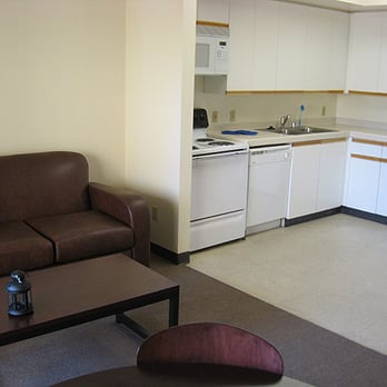 Fraternity Row - Living Room and Kitchen - University Housing Near Me - San Diego, California Fraternity Row - Living Room and Kitchen - University Housing Near Me - San Diego, California