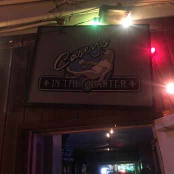Casey's - a neon sign above a doorway - Dive Bars Near Me - New Smyrna Beach, Florida Casey's - a neon sign above a doorway - Dive Bars Near Me - New Smyrna Beach, Florida