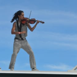 Bodega Seafood, Art & Wine Festival - Violinist takes to the air above a coffee kiosk -- good coffee and music.