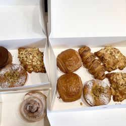 Cremcrittos - Chocolate cronut, chocolate croissant, almond croissant, hot dog in croissant, pistachio pastry, cinnamon roll