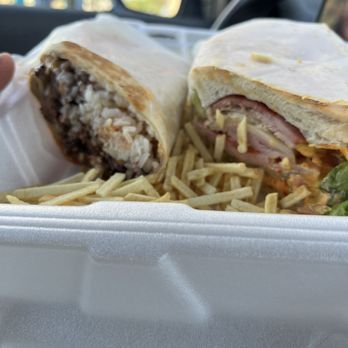 Moritas Cuban Cafe - Caribbean wrap on the left, Cuban Sandwich on the right! - Cuban Near Me - Cudjoe Key, Florida Moritas Cuban Cafe - Caribbean wrap on the left, Cuban Sandwich on the right! - Cuban Near Me - Cudjoe Key, Florida