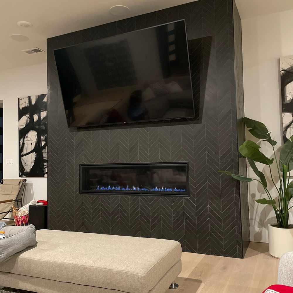 Our beautiful tiled fireplace Our beautiful tiled fireplace