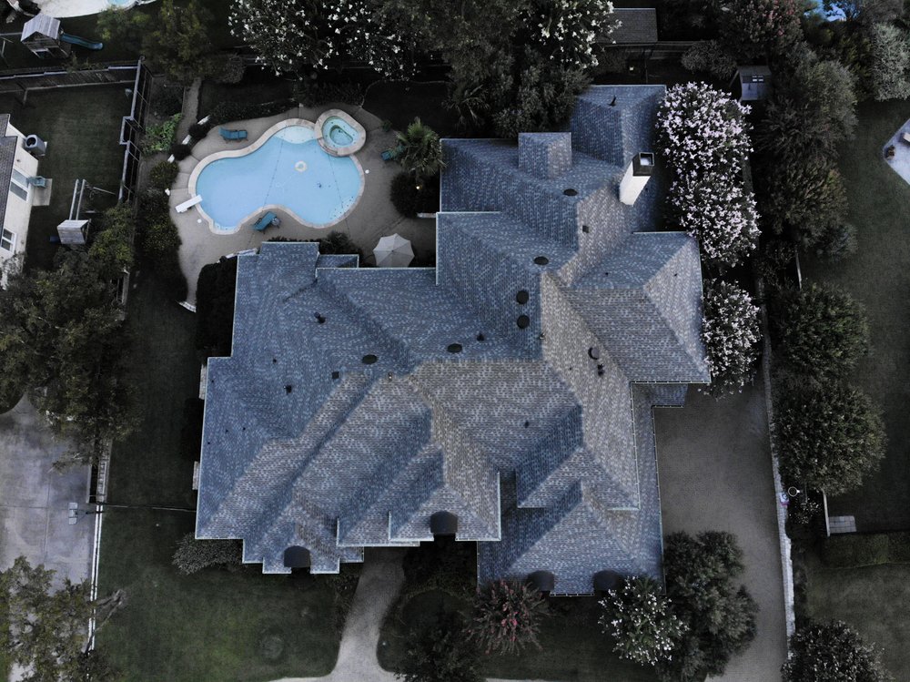 Slide of Joe Hall Roofing