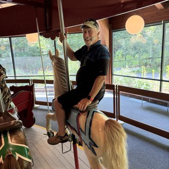 Heritage Museums & Gardens - My dad, riding the carousel - Botanical Gardens Near Me - Sandwich, Massachusetts Heritage Museums & Gardens - My dad, riding the carousel - Botanical Gardens Near Me - Sandwich, Massachusetts