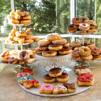 The Jenny Layne Bakery - Jenny went and bought donuts for my wedding (they say best day ever at the base) and arranged them on stands for me! - Custom Cakes Near Me - Argyle, Texas
