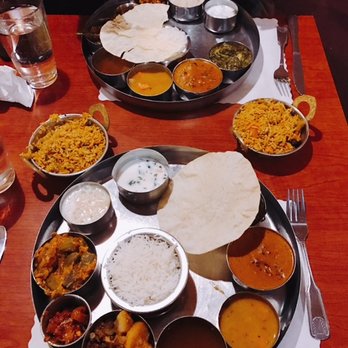 Madras Masala - Vegetarian Thali plate: several curries, rice, pappadam, raita and payasam - Indian Near Me - Ann Arbor, Michigan Madras Masala - Vegetarian Thali plate: several curries, rice, pappadam, raita and payasam - Indian Near Me - Ann Arbor, Michigan