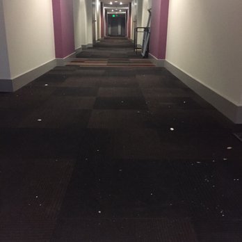 Avenue 64 - The entrance to my apartment has been this messy for over a week now, but the front entrances to the leasing office are cleaned daily. - Apartments Near Me - Emeryville, California
