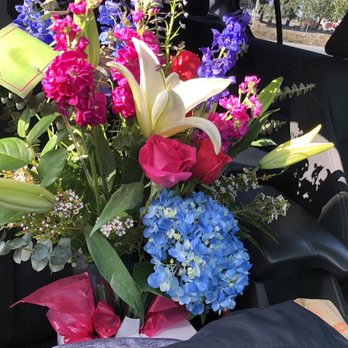 The Flower Cottage - Gorgeous Ocean Dance bouquet! The cool vase is blue too. - Florists Near Me - Sunnyvale, California The Flower Cottage - Gorgeous Ocean Dance bouquet! The cool vase is blue too. - Florists Near Me - Sunnyvale, California