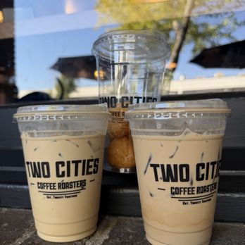 Two Cities Coffee Roasters - cashmere latte on the left, 007 on the right lol and donut holes in the middle - Coffee Roasteries Near Me - Clovis, California Two Cities Coffee Roasters - cashmere latte on the left, 007 on the right lol and donut holes in the middle - Coffee Roasteries Near Me - Clovis, California