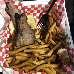 Hog Pit BBQ - Two slices of brisket and a small side for $20. It was average. Would never pay that much again for two average pieces of brisket