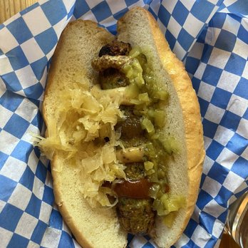 München Haus - Spinach Chicken sausage with relish, sauerkraut and sample of 5 different mustards - German Near Me - Leavenworth, Washington München Haus - Spinach Chicken sausage with relish, sauerkraut and sample of 5 different mustards - German Near Me - Leavenworth, Washington