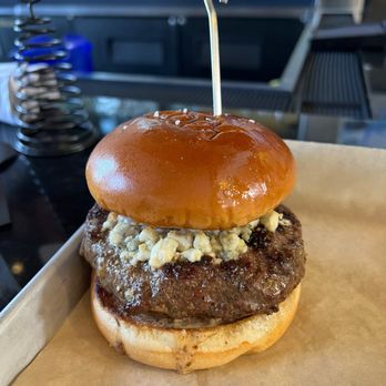Apex at Seven - a burger on a bun - New American Near Me - Sebring, Florida