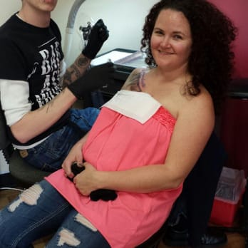 Assassin Tattoo Studio - Shaun working on my military spouse tattoo - Tattoo Near Me - Akron, Ohio Assassin Tattoo Studio - Shaun working on my military spouse tattoo - Tattoo Near Me - Akron, Ohio