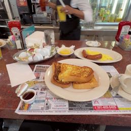 Sausage, eggs, French toast. Sausage, eggs, French toast.