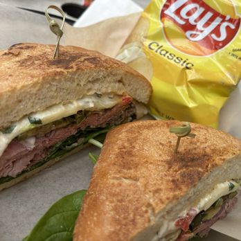 Prontos' Gourmet Market - ROAST BEEF-JALAPEÑO CIABATTA (jalapeños, onions, fresh spinach, sharp provolone, and artichoke spread on grilled ciabatta) with chips - Sandwiches Near Me - Carlsbad, California Prontos' Gourmet Market - ROAST BEEF-JALAPEÑO CIABATTA (jalapeños, onions, fresh spinach, sharp provolone, and artichoke spread on grilled ciabatta) with chips - Sandwiches Near Me - Carlsbad, California