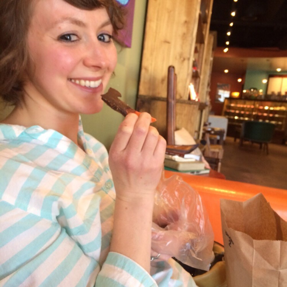 Chocolate Dude - K enjoying her hairdresser's favorite, a spicy chocolate-dipped mango slice. - Coffee & Tea Near Me - Albuquerque, New Mexico Chocolate Dude - K enjoying her hairdresser's favorite, a spicy chocolate-dipped mango slice. - Coffee & Tea Near Me - Albuquerque, New Mexico