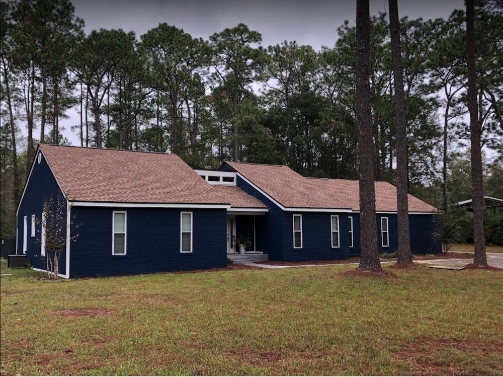 Slide of Timberman Roofing