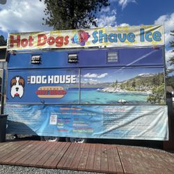 The Dog House - The Dog House Hot Dog and Shaved Ice kiosk truck stop.