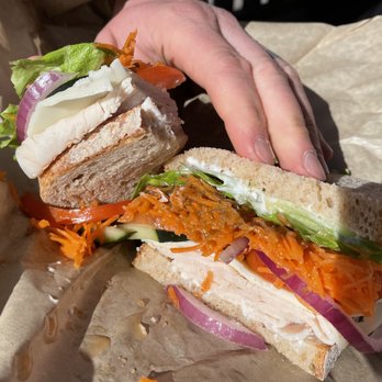 The Village Baker - Garden Turkey - oven-roasted turkey with fresh tomato, cucumber, red onion, carrot, leaf lettuce and provolone cheese with garlic mayonnaise - Bakeries Near Me - Bend, Oregon
