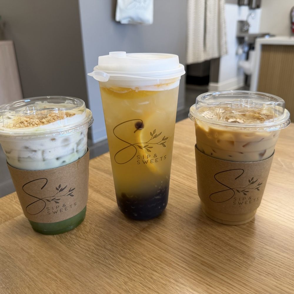 Drinks in order from left to right: Banana Cream Matcha, Mango Breeze Fresh Tea, Salted Caramel Iced Latte Drinks in order from left to right: Banana Cream Matcha, Mango Breeze Fresh Tea, Salted Caramel Iced Latte