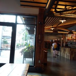 Interior of Notch Brewing (right) and outside bier garden (left) Interior of Notch Brewing (right) and outside bier garden (left)