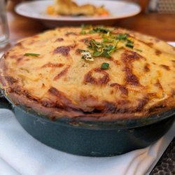 Kipos Greek Taverna - Moussaka. $19. Eggplant, beef, potato, bechamel souffle.